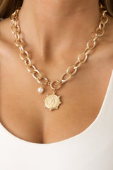 A Regal Traveller Gold Charm Statement Chain Necklace