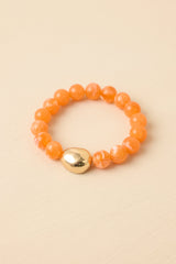 Always a Soft Spot Orange Beaded Gold Accent Stretch Bracelet