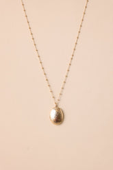 On Repeat Gold Locket Necklace