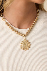Under The Open Sky Worn Gold Beaded Pendant Necklace