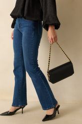 A Subtle Reminder Black Faux Leather Baguette Handbag