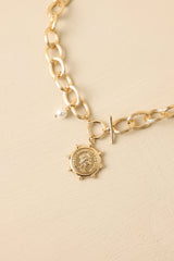 A Regal Traveller Gold Charm Statement Chain Necklace