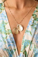 On Repeat Gold Locket Necklace