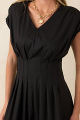 Stark Differences Black & Ivory Contrast Pleated Midi Dress