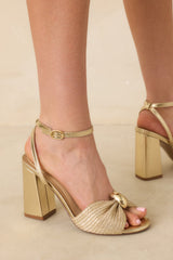 Charmed I'm Sure Gold Woven Bow Block Heel Sandals