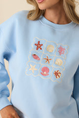 Collected Moments Light Blue Embroidered Crewneck Sweatshirt