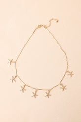 Coasting With Confidence Gold Textured Starfish Charm Necklace