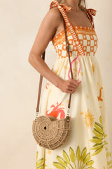 Living on the Curve Golden Natural Woven Nautilus Crossbody