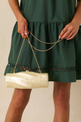 Got My Spark Back Champagne Pearlescent Spiral Clutch