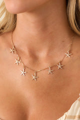 Coasting With Confidence Gold Textured Starfish Charm Necklace