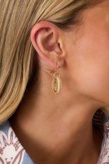 Long Story Short Gold Textured Oval Drop Earrings