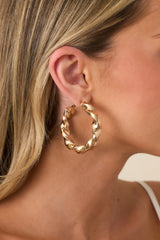 Twist of Fate Gold Sculptural Hoop Earrings