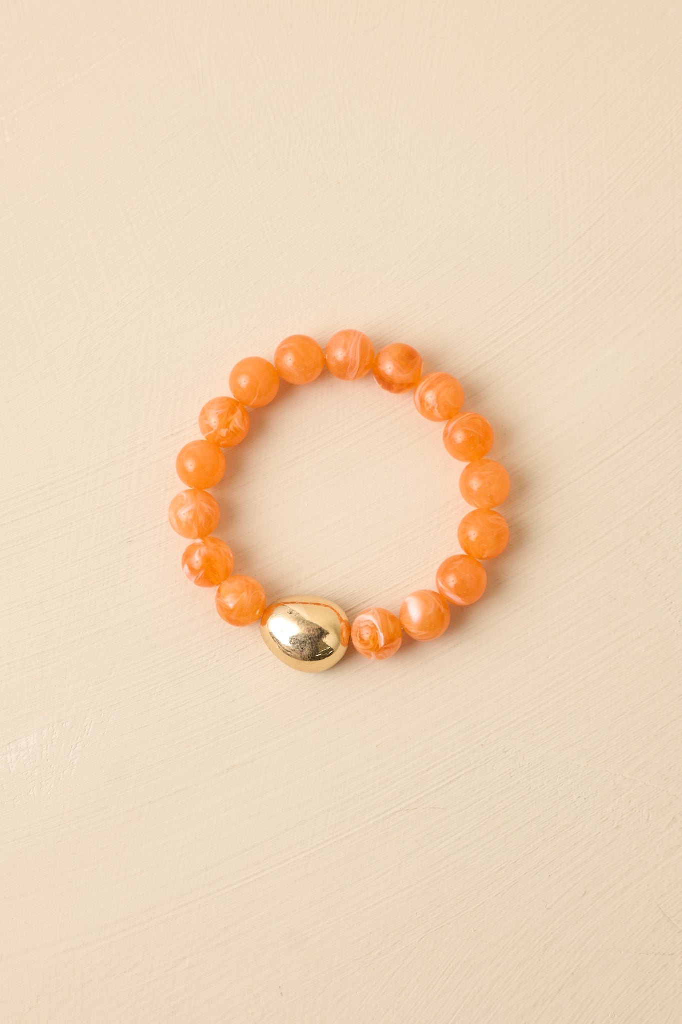 Always a Soft Spot Orange Beaded Gold Accent Stretch Bracelet