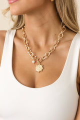 A Regal Traveller Gold Charm Statement Chain Necklace
