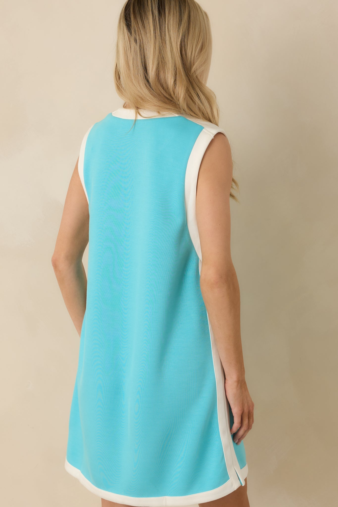 Well Defined Aqua Blue Jersey Knit Contrast Trim Sleeveless Mini Dress