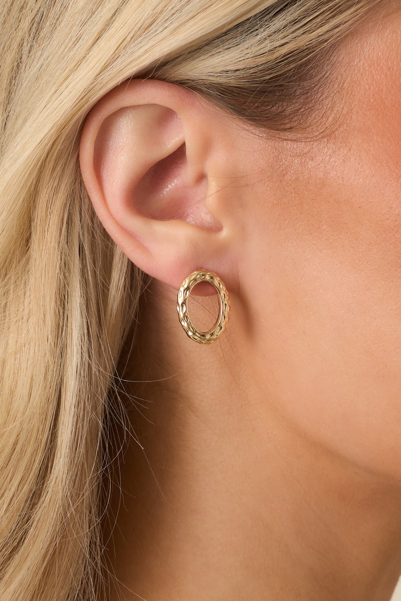 Chosen with Care Gold Textured Oval Stud Earrings