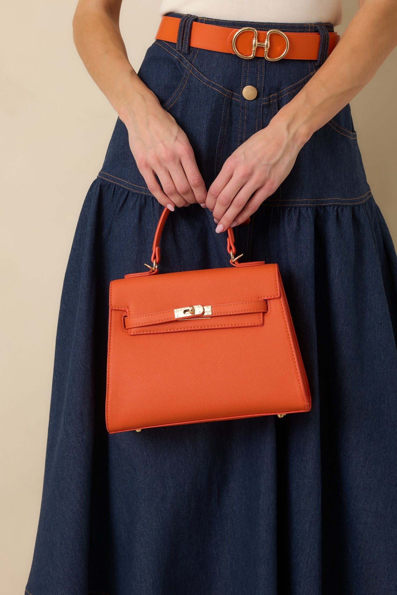 Reign It In Orange Faux Leather Twist Lock Handbag