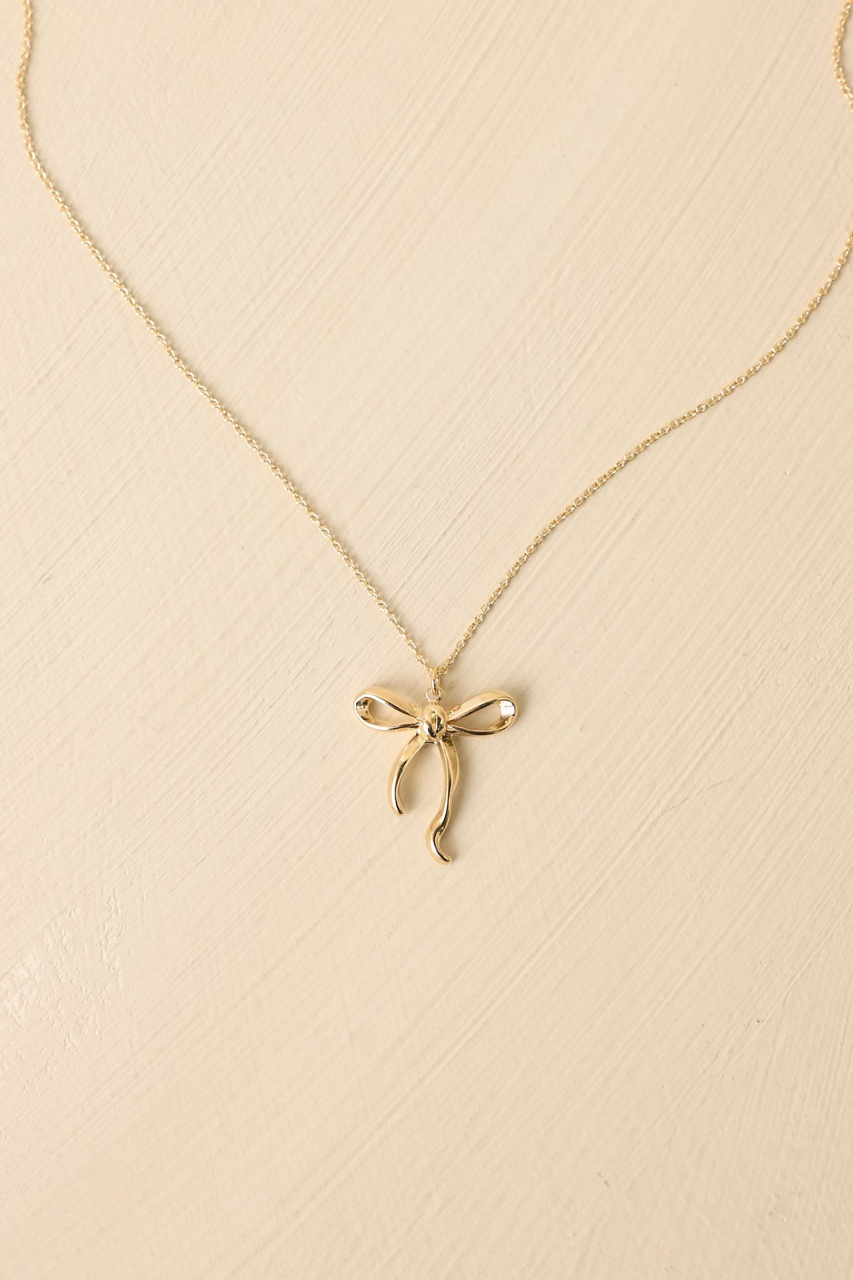The Sweetest Detail Gold Bow Pendant Necklace