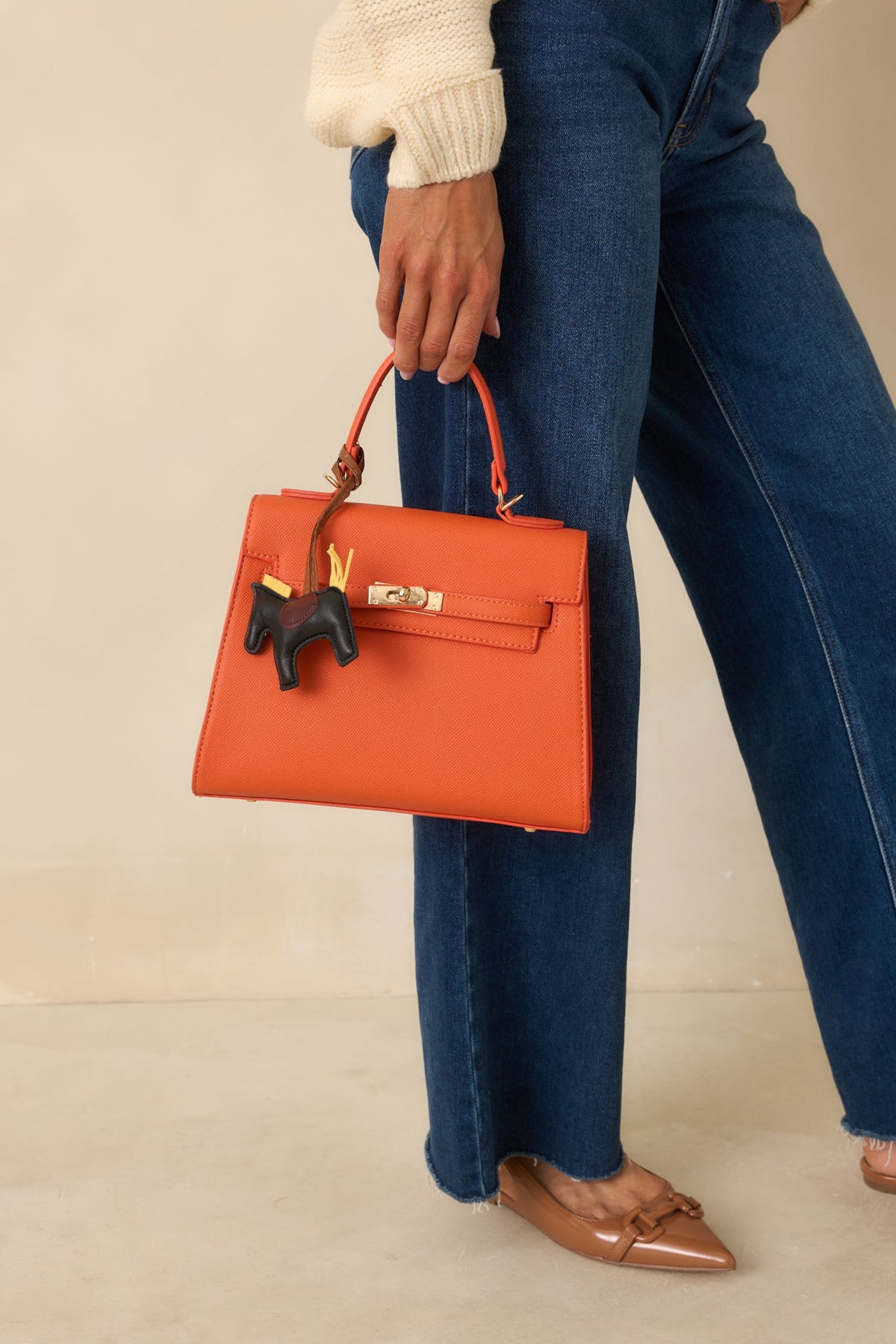 Reign It In Orange Faux Leather Twist Lock Handbag