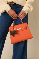 Reign It In Orange Faux Leather Twist Lock Handbag