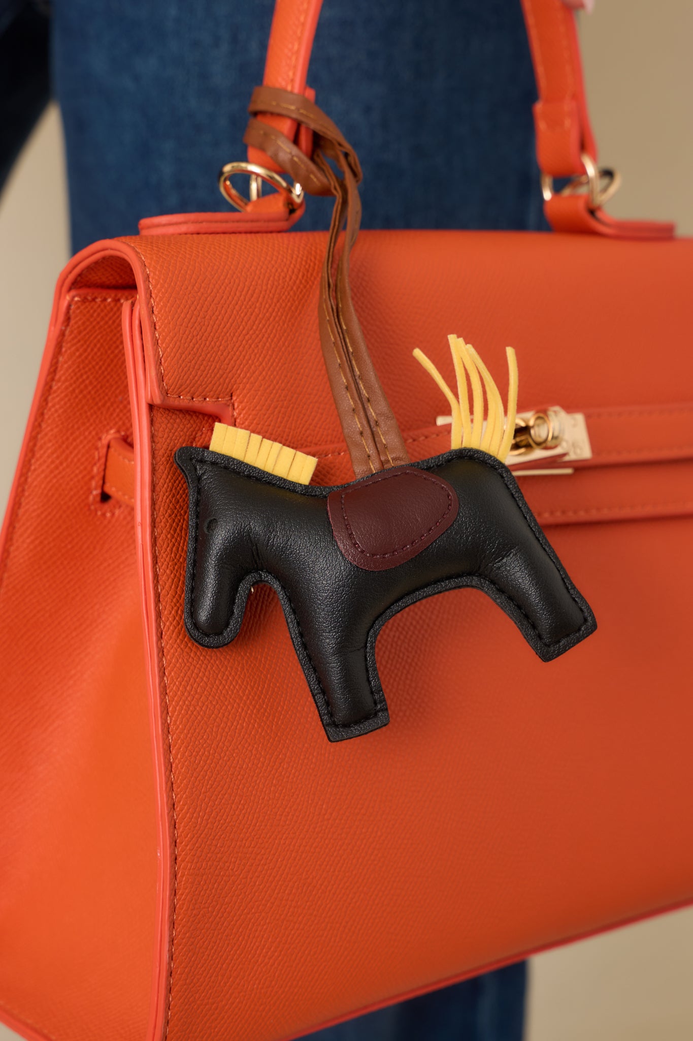 Reign It In Orange Faux Leather Twist Lock Handbag