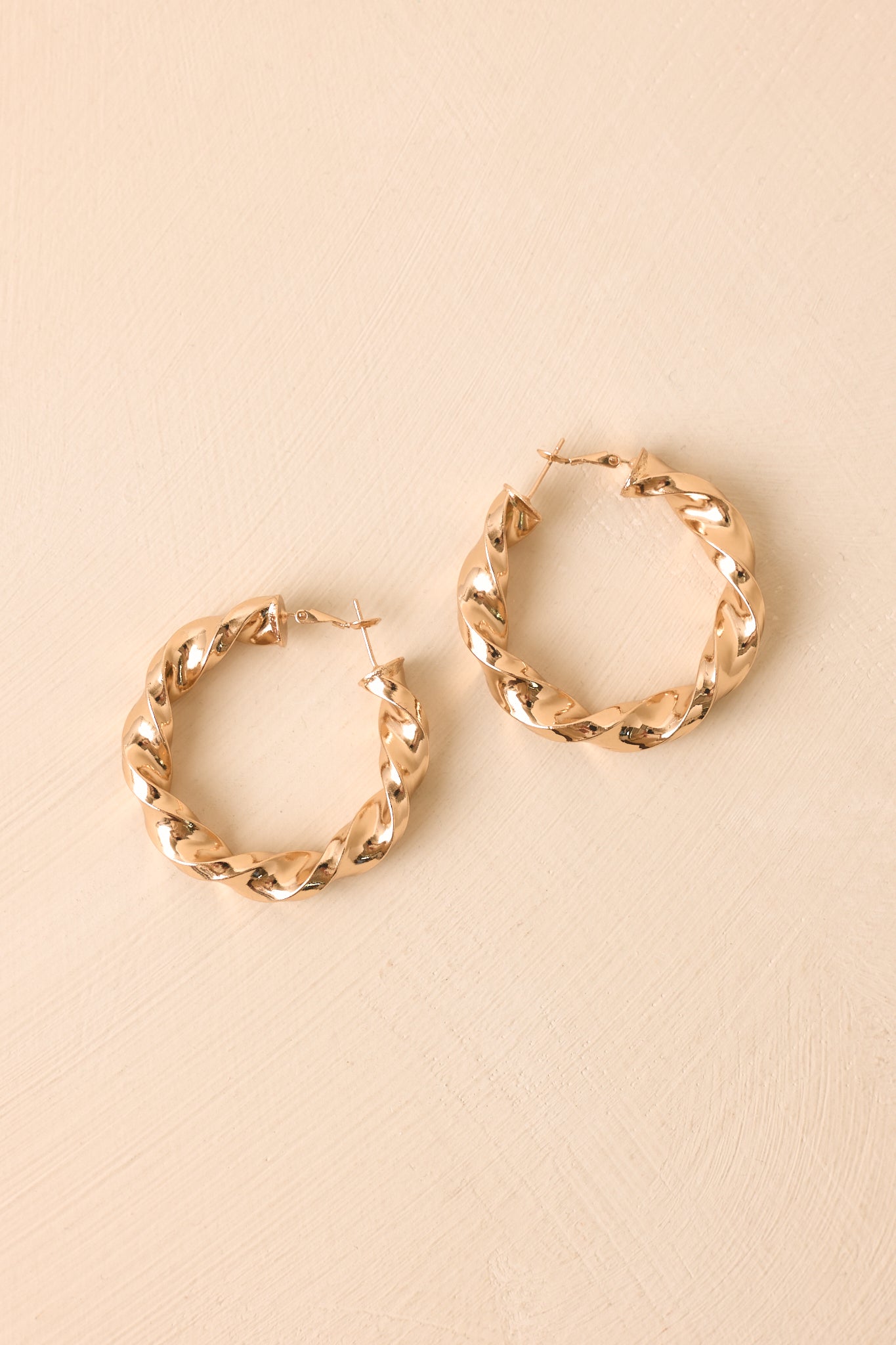 Twist of Fate Gold Sculptural Hoop Earrings