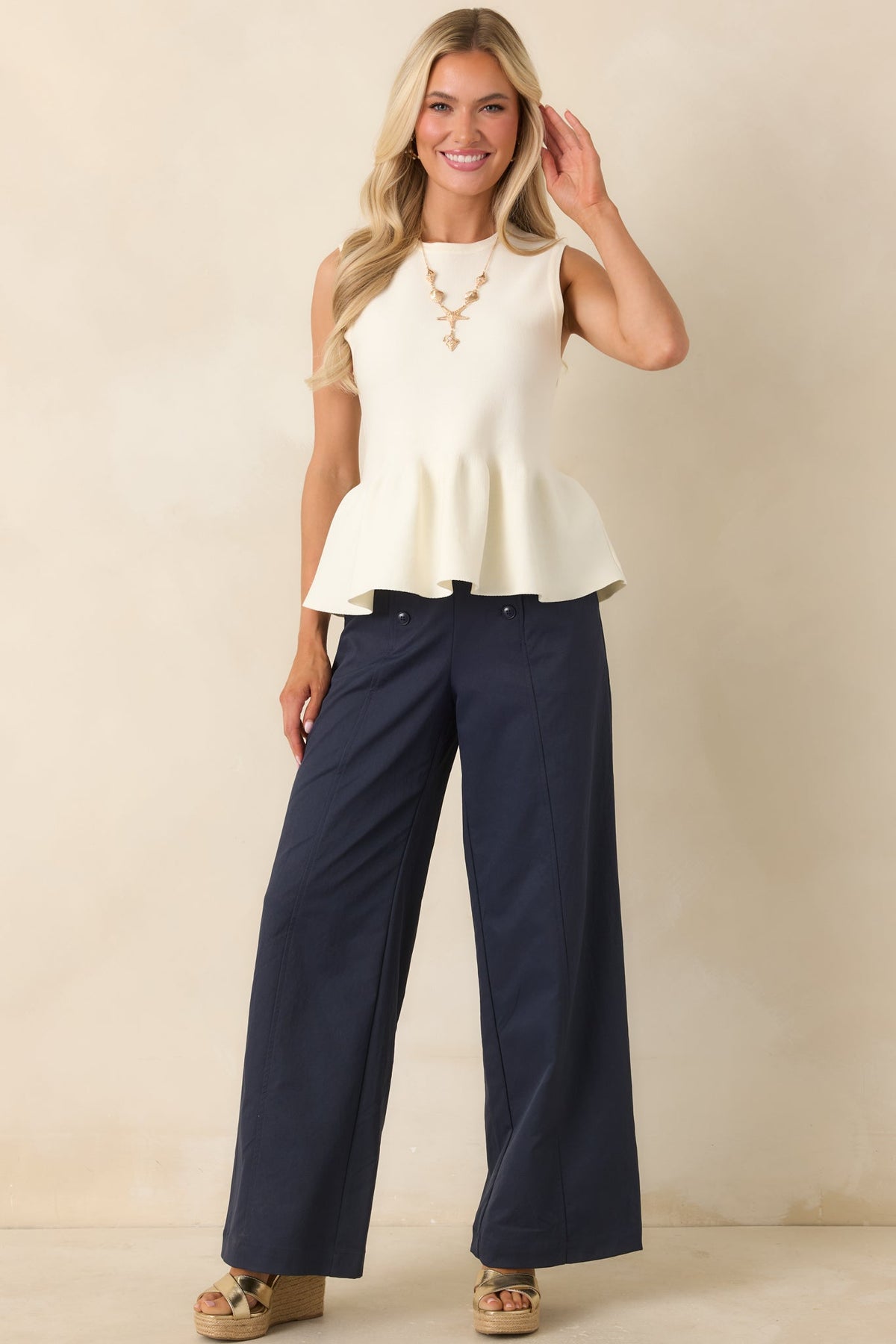 It Just Works Ivory Knit Sleeveless Peplum Top