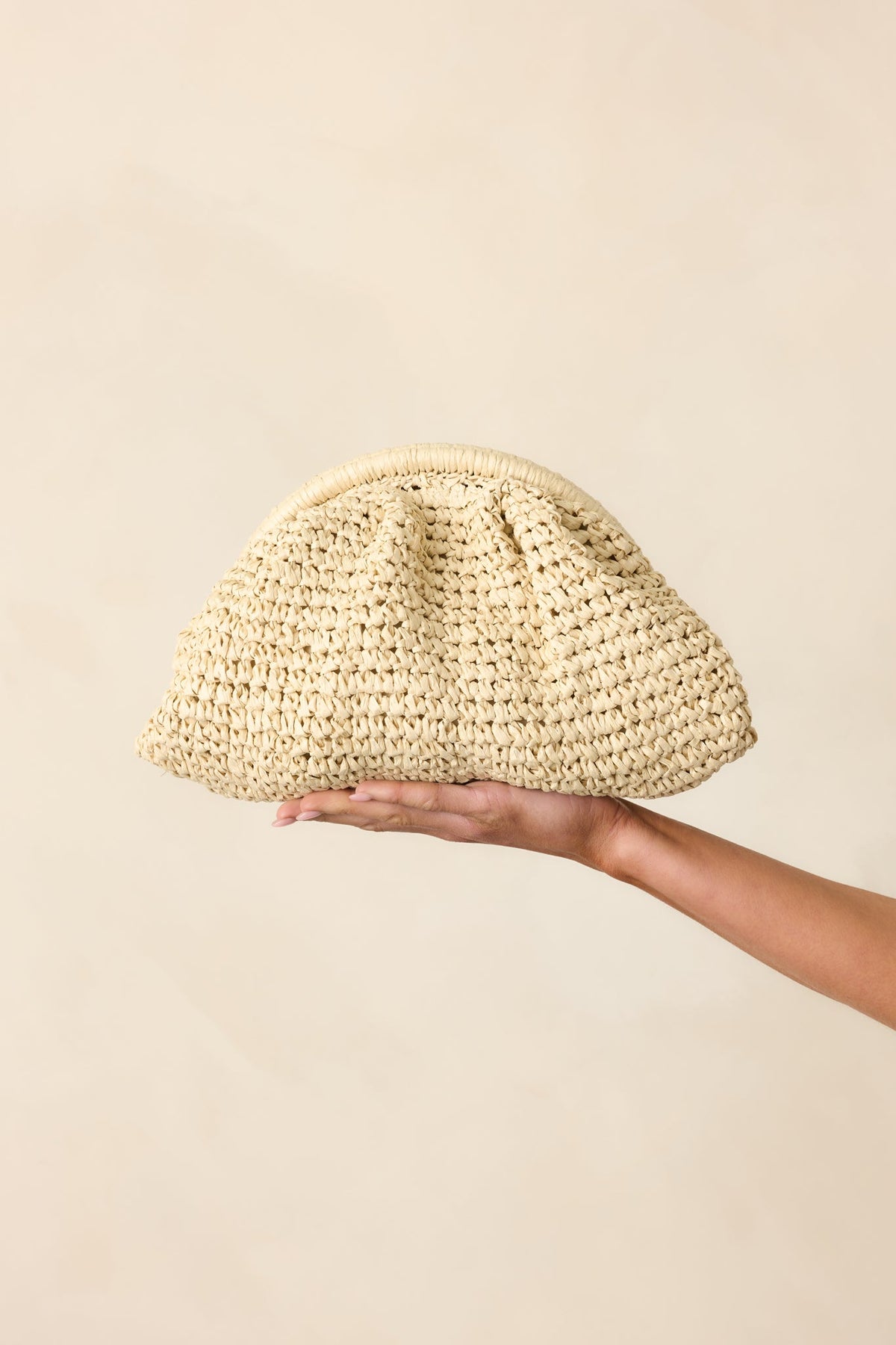 Something To See Ivory Raffia Woven Clutch