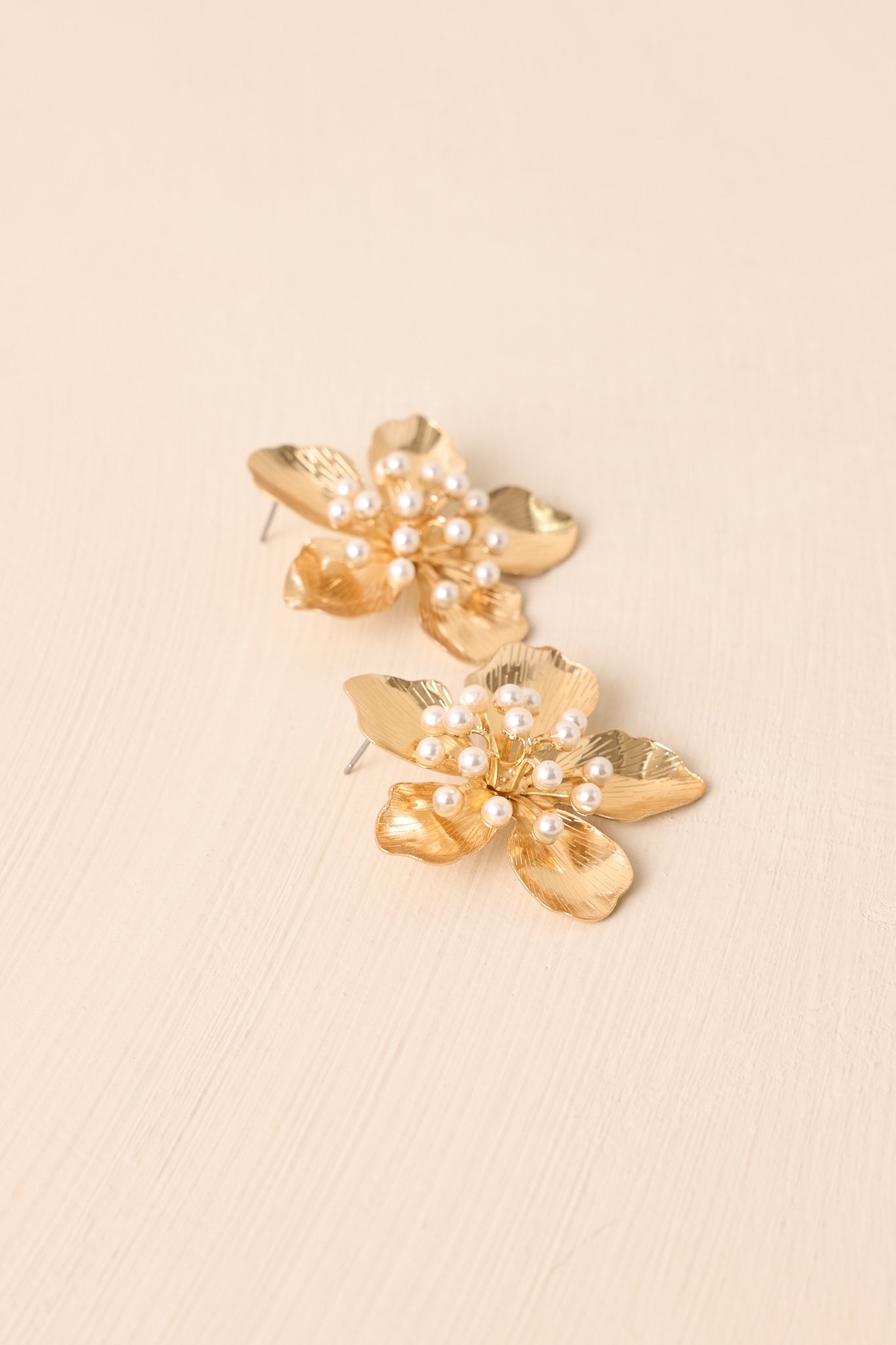 Conquer The World Textured Gold Flower Earrings