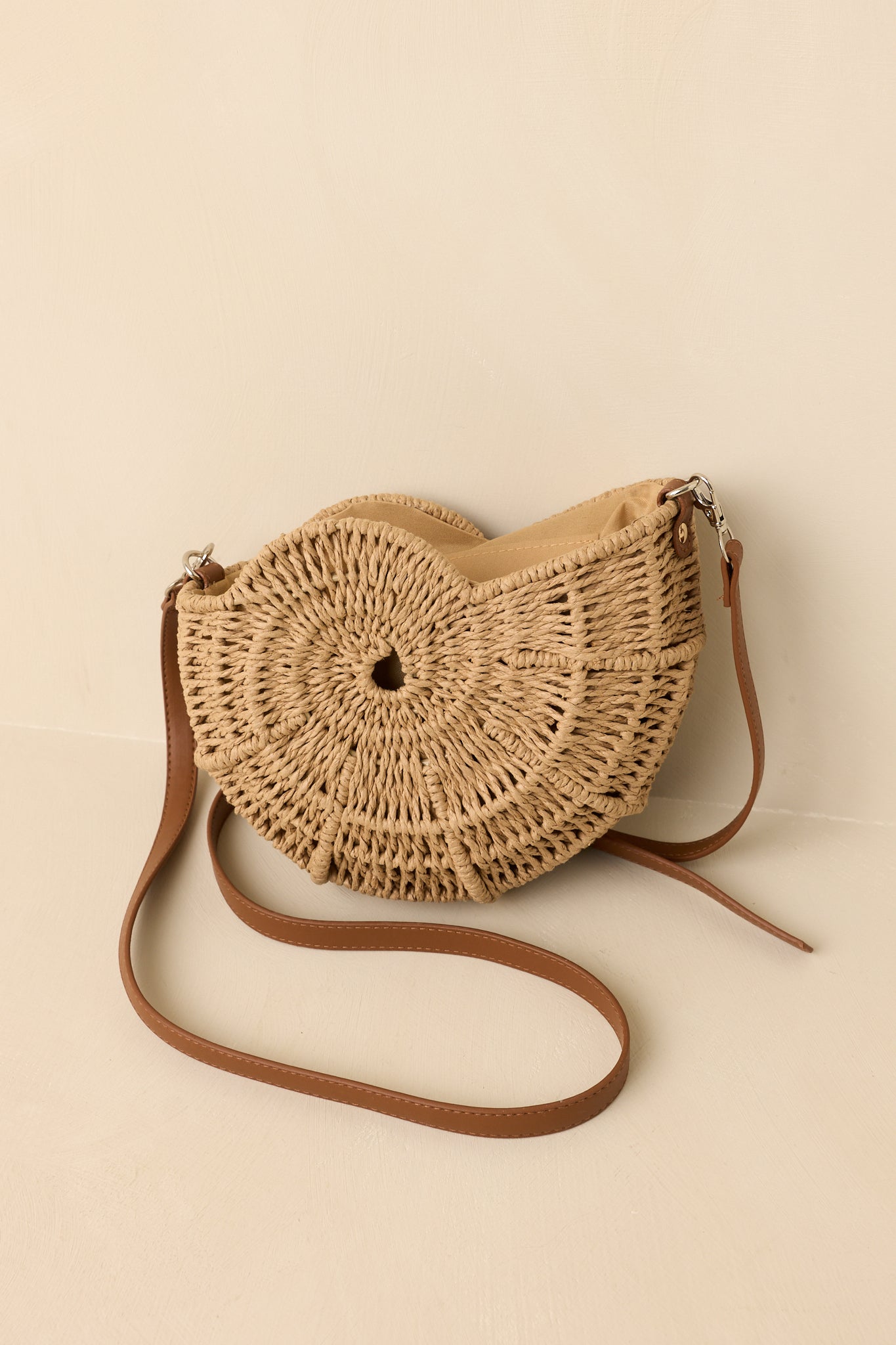 Living on the Curve Golden Natural Woven Nautilus Crossbody