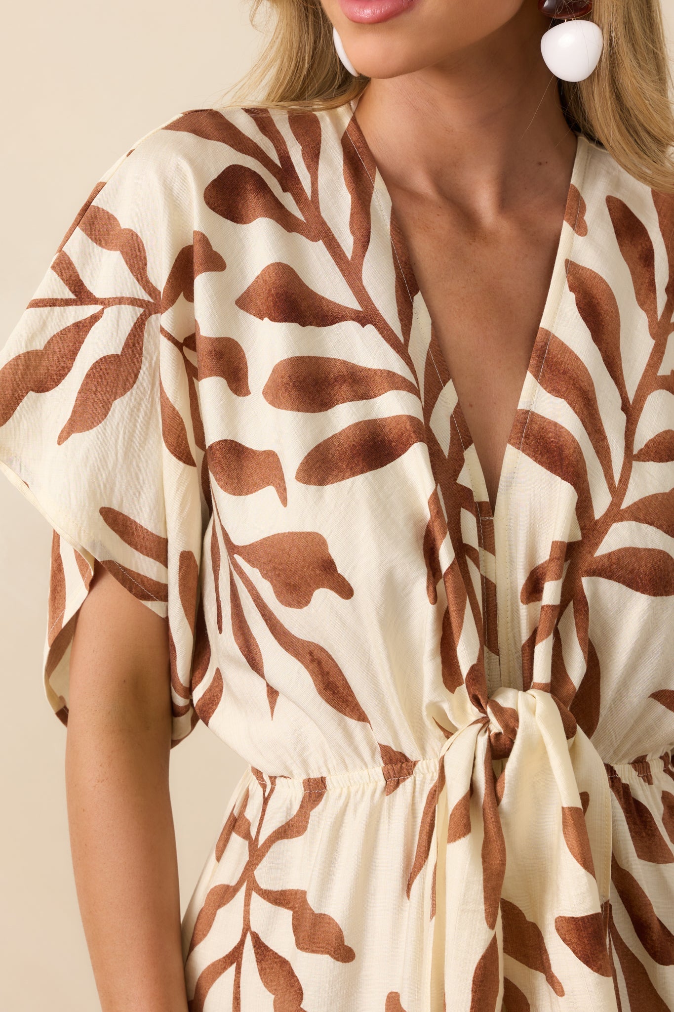 Stepping Into Greatness Light Brown Botanical Print Jumpsuit