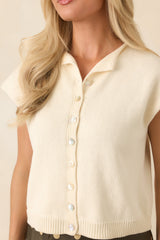 Let's Do This Ivory Sleeveless Button Front Top