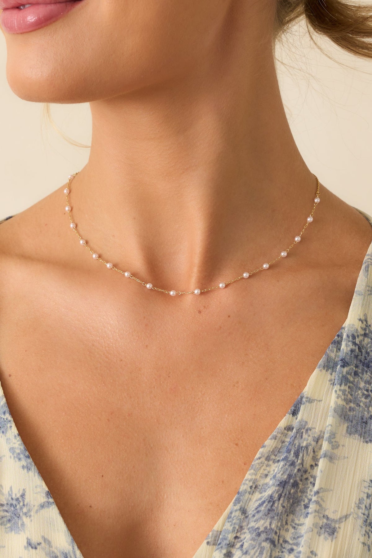 Pure Elegance Gold Ivory Pearl Necklace