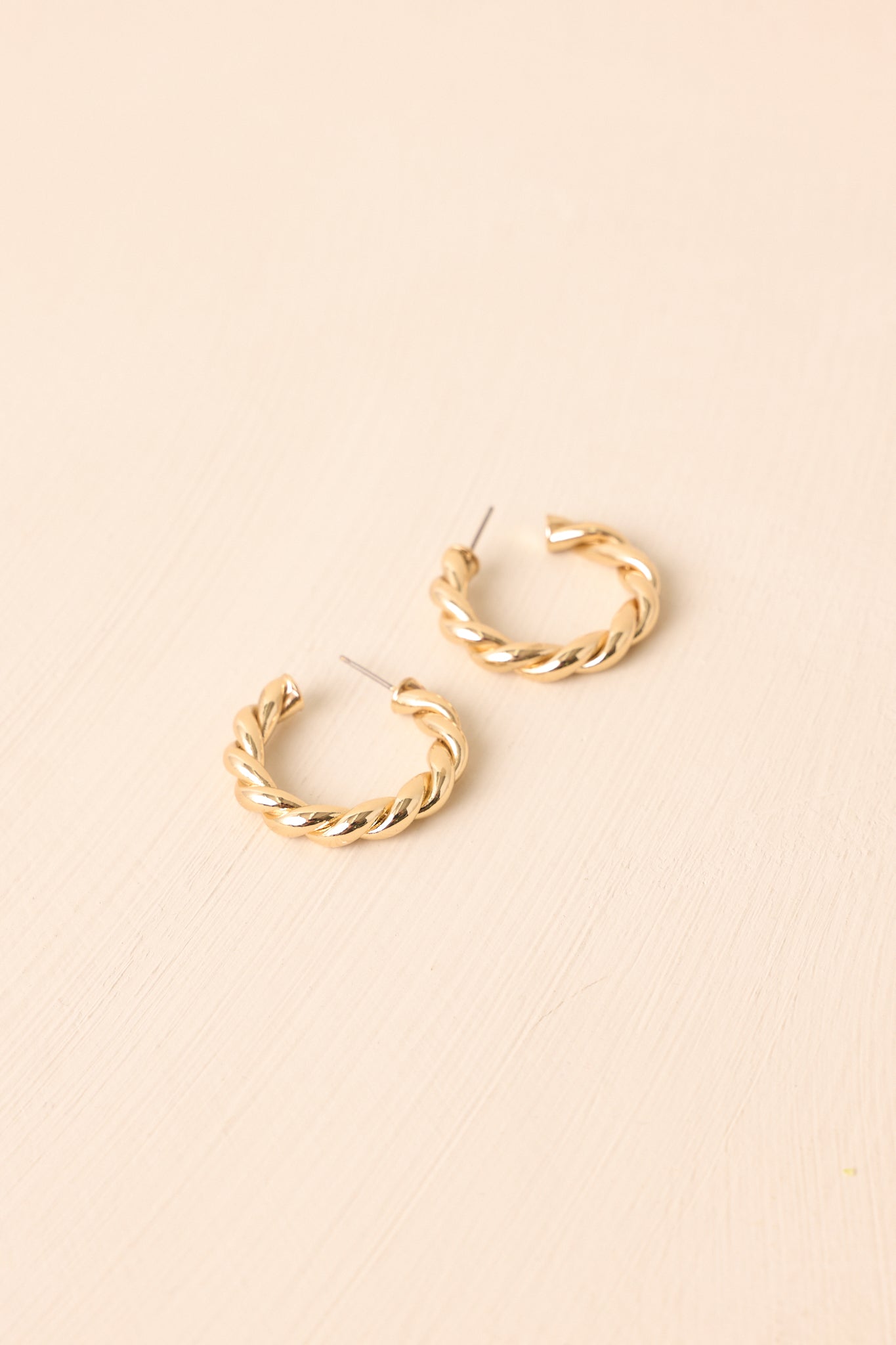 I Already Decided Gold Twisted Hoop Earrings