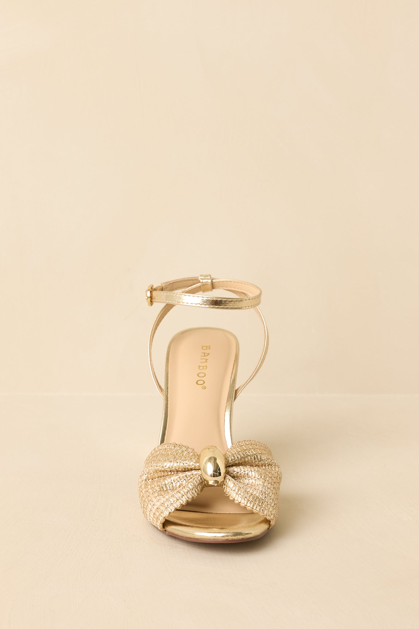 Charmed I'm Sure Gold Woven Bow Block Heel Sandals