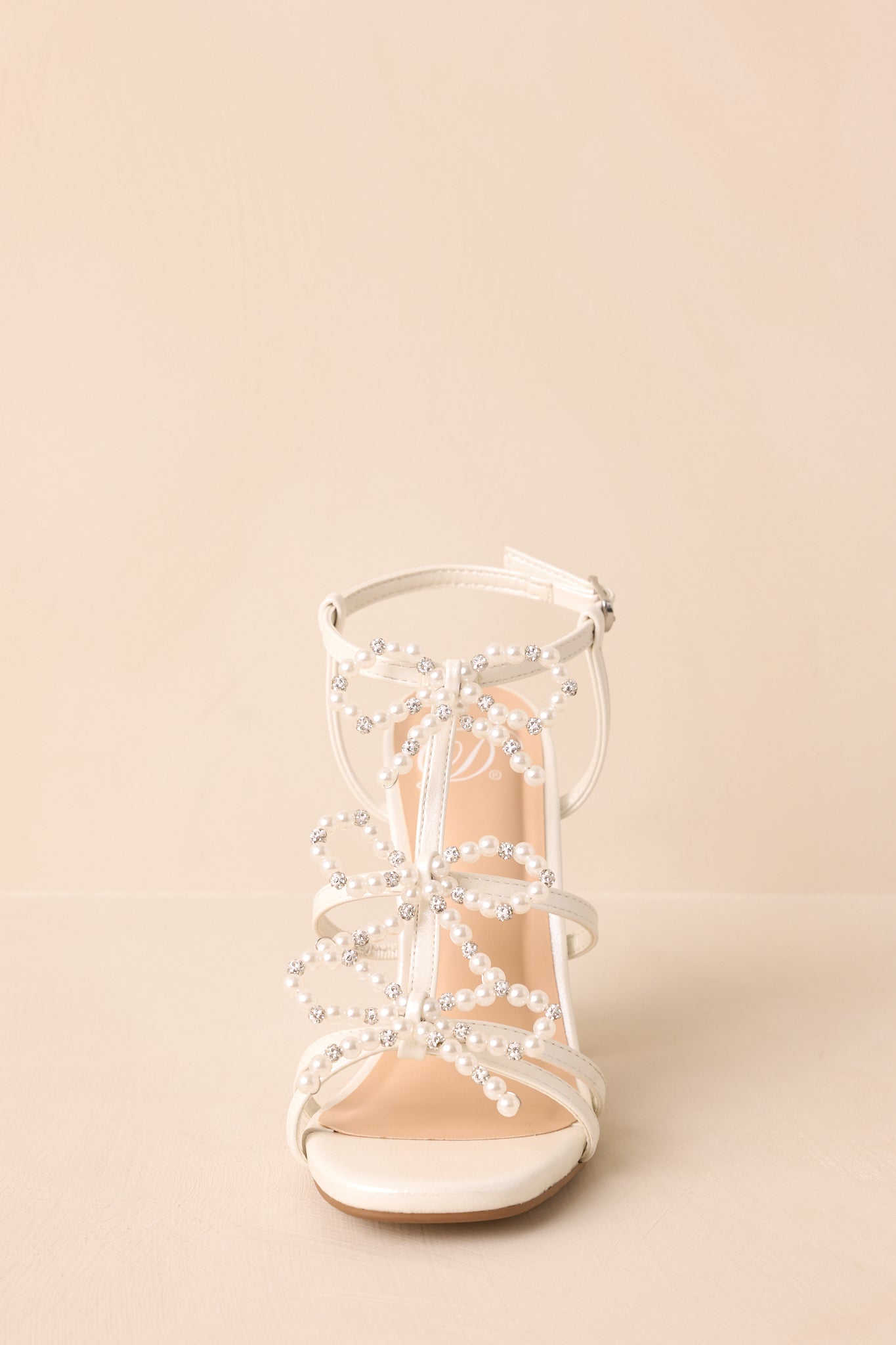 Reaching Higher Ivory Pearl Bow Front Ankle Strap Heels