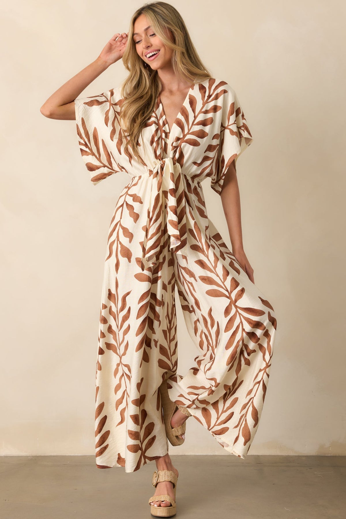 Stepping Into Greatness Light Brown Botanical Print Jumpsuit