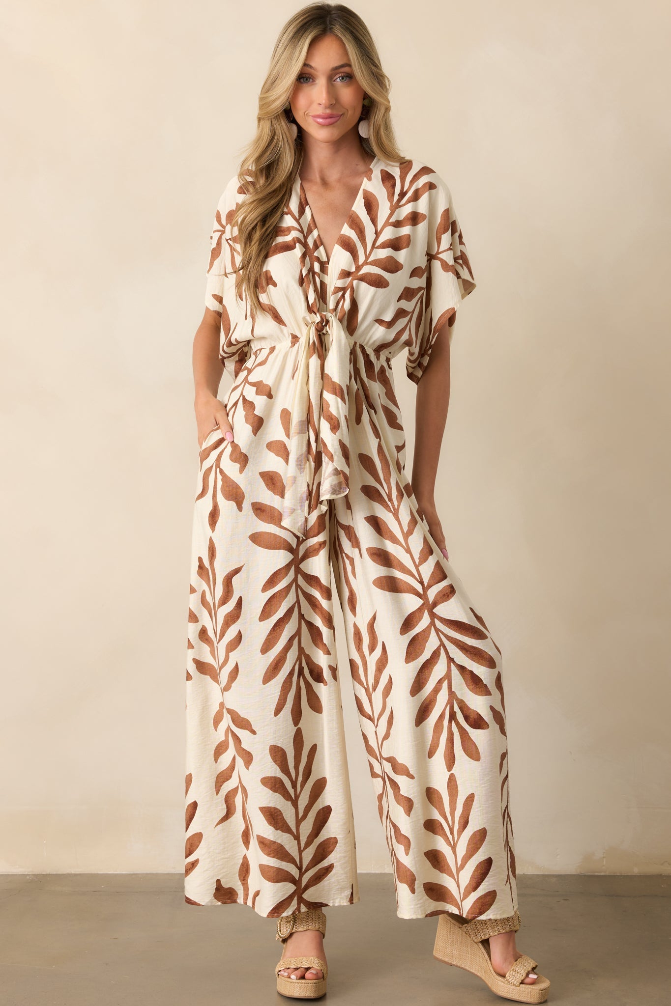 Stepping Into Greatness Light Brown Botanical Print Jumpsuit