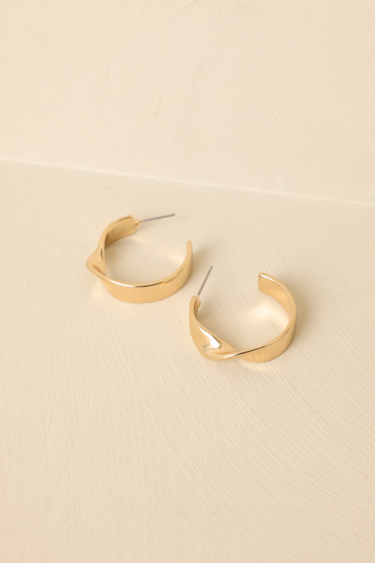 Unexpected Twist Gold Hoop Earrings