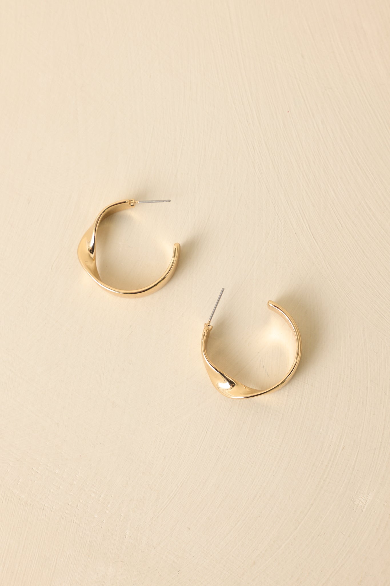 Unexpected Twist Gold Hoop Earrings