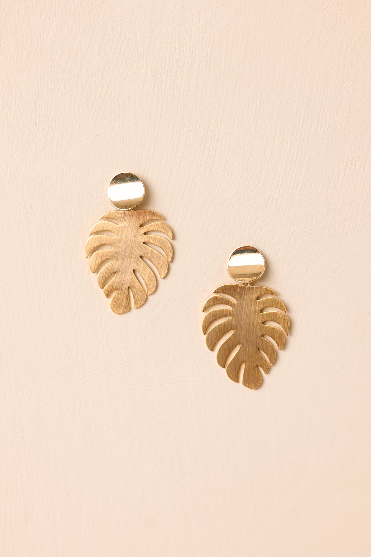 A Radiant Escape Gold Palm Leaf Drop Earrings