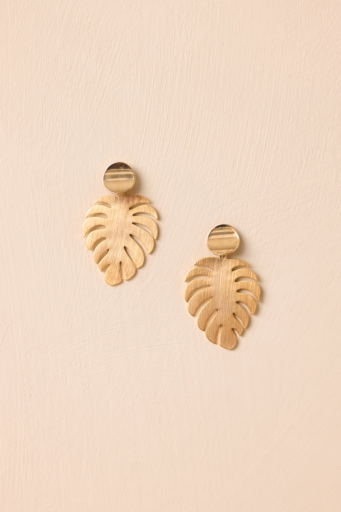 A Radiant Escape Gold Palm Leaf Drop Earrings
