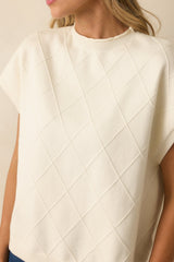 The Clear Choice Ivory Short Sleeve Argyle Stitch Sweater