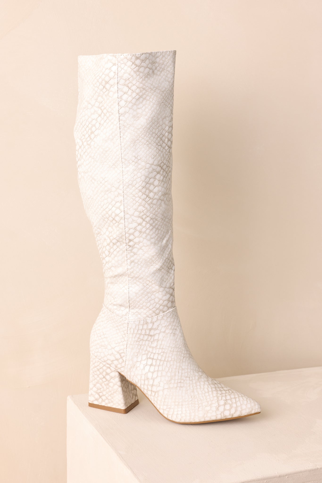 Always A Step Ahead Ivory Faux Snakeskin Knee High Boots