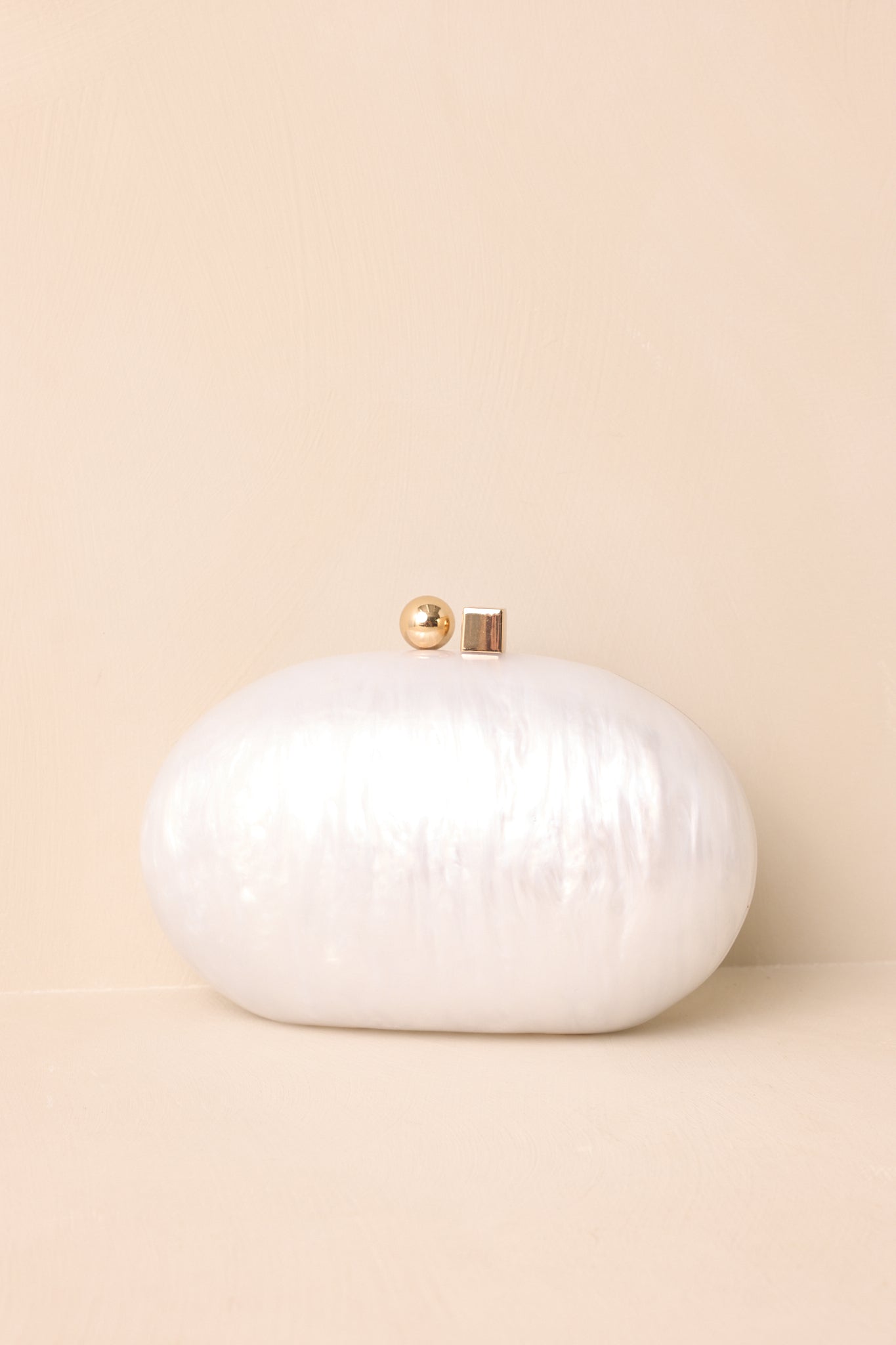 Worth Remembering Ivory Pearlescent Rounded Clutch Bag