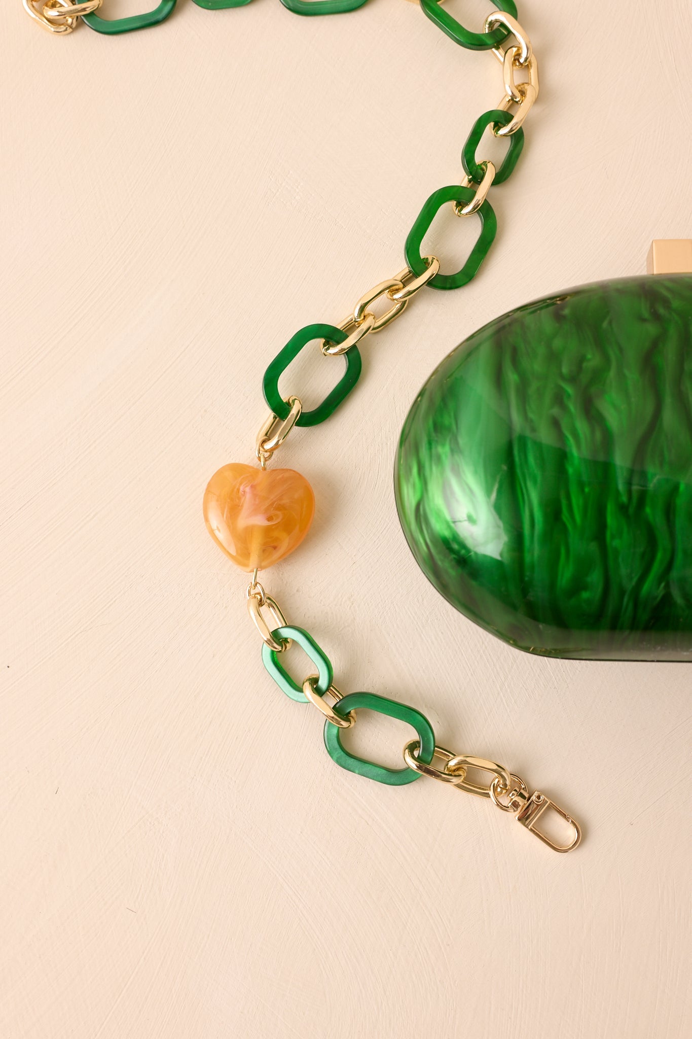 Worth Remembering Emerald Green Pearlescent Rounded Clutch Bag
